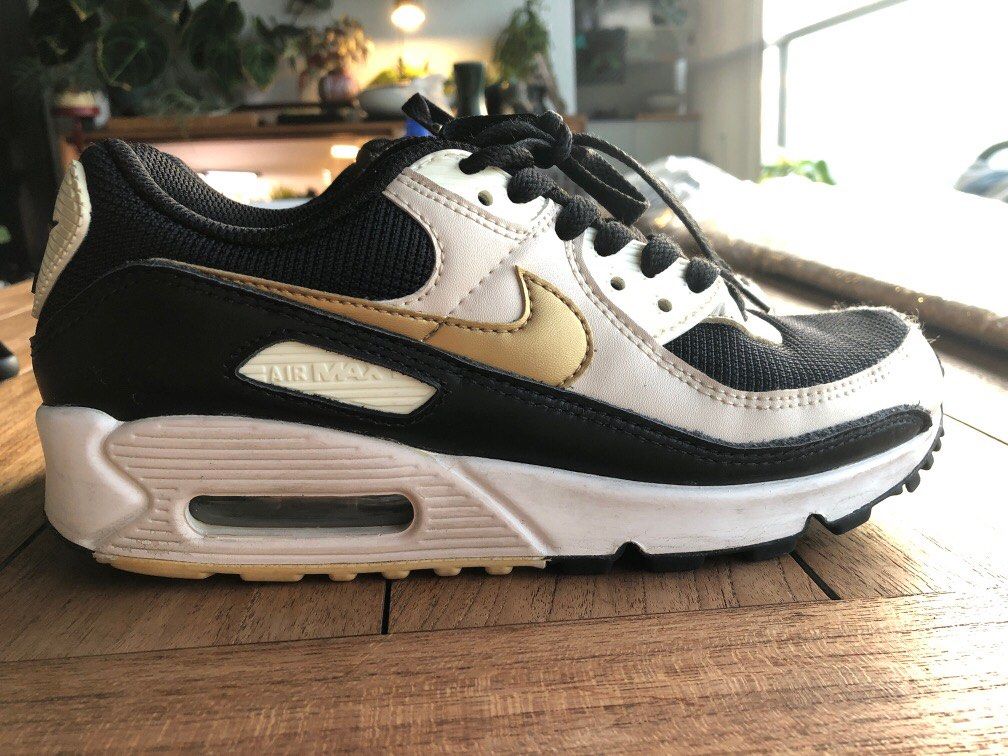 Gold and black hot sale air maxes