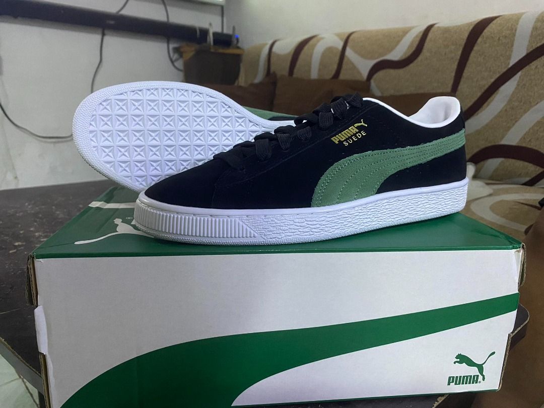 Forest green suede pumas
