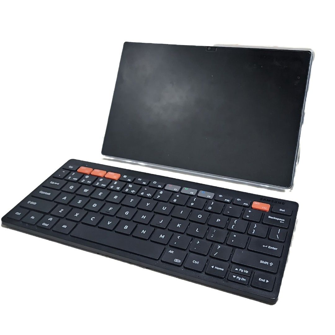 Samsung Smart Keyboard Trio 500 (Category: Computer Keyboard) located in Manila. Submitted by BeachBoy (Listing ID 1232678554, Image 3). Description: Purchased in April 2023, barely used. • Pair multiple devices & switch with a click • Wireless keyboard to-go for when you're on the go • Assign custom Hot Keys to your favorite apps Physical specification • Dimension (WxHxD)280.4 X 127.4 X 15.4 mm • Weight412.3 g Type • Bluetooth Keyboard General F