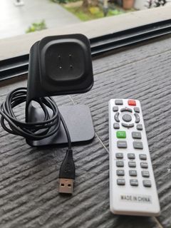 Smartwatch charger + Free remote(no idea)