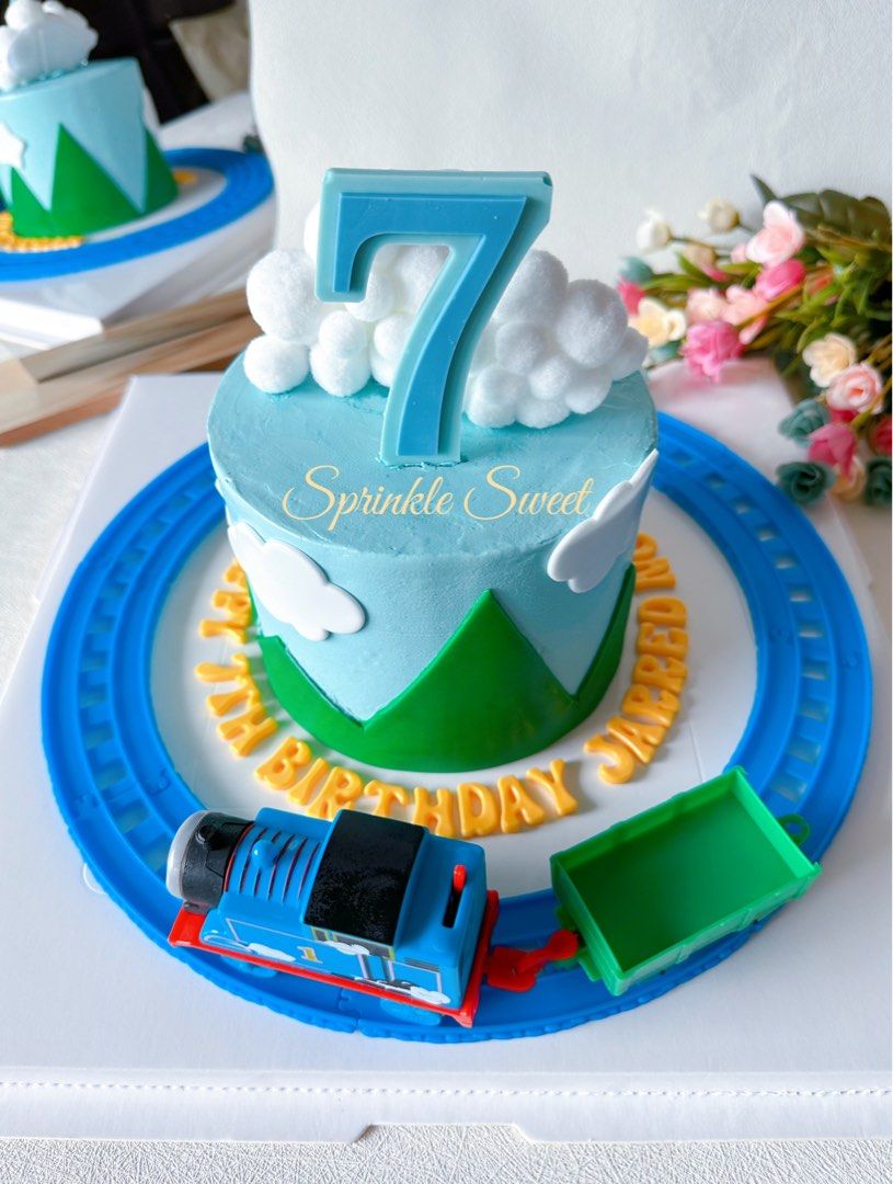 Thomas the tank themed Rotating Carousel with Moving Train Cake
