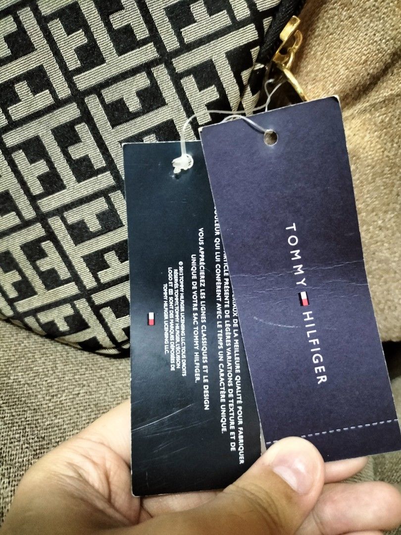 Tommy Hilfiger Zip Case (Category: Luxury Bags & Wallets) located in San Pedro. Submitted by adicarteu_ (Listing ID 1232745017, Image 2). Description: Tommy Hilfiger Zip Case ⌗ Brand new, tags and filler still intact ⌗ Authentic Though the item is brand new, the hardware has minor scratches due to storage MOP: Gcash,BPI Transfer.