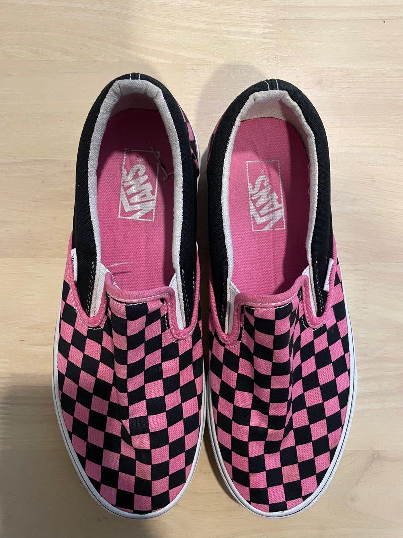 Pink and black checkerboard store vans