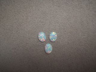 3 pc. 7x9 mm oval white Opal 2.21ct.