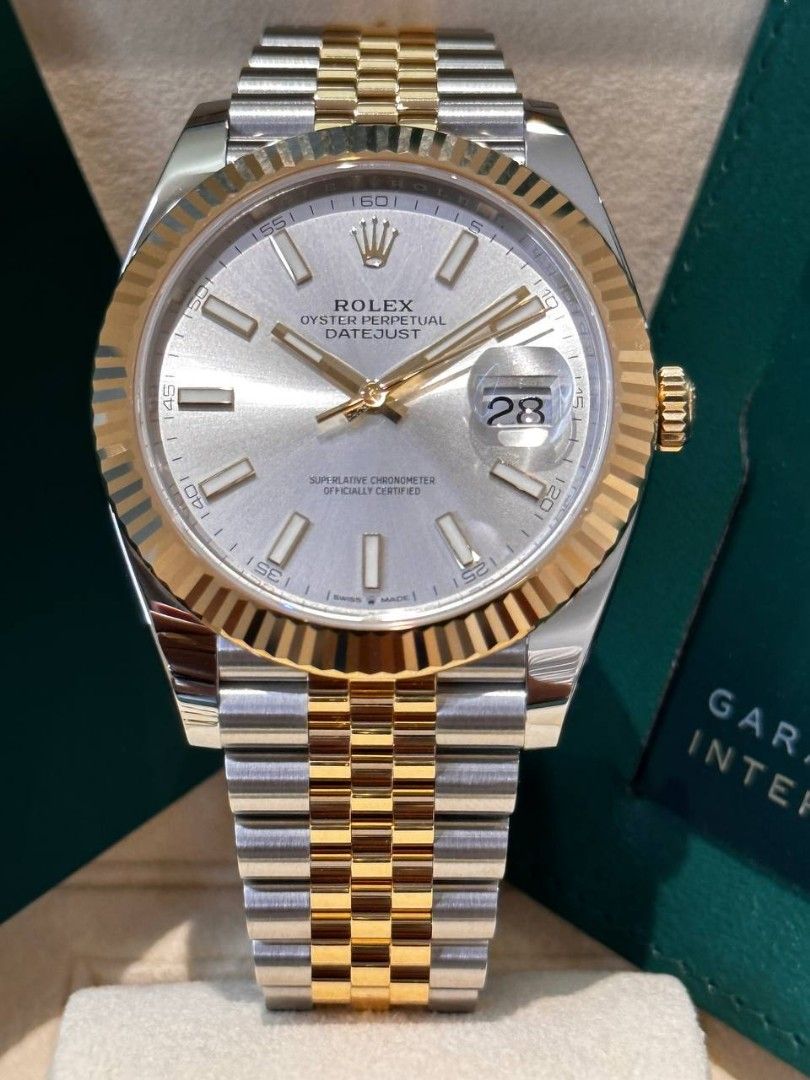 Rolex oyster perpetual silver and gold sales