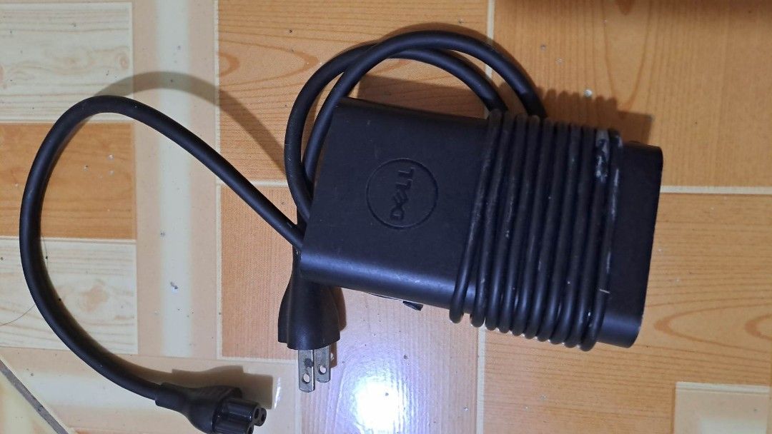 Dell laptop charger (Category: Chargers) located in Cavite. Submitted by dresseyy_collections (Listing ID 1229718420, Image 1). Description: .