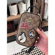 COACH®  Disney X Coach Eva Phone Crossbody In Signature Canvas With Patches