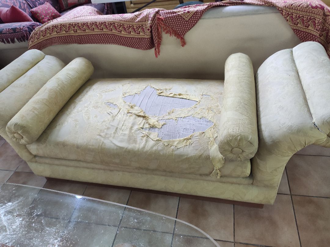 ITALIAN CLEOPATRA SOFA (Category: Sofas) located in Quezon City. Submitted by furnitures53134 (Listing ID 1229807663, Image 1). Description: This sofa has been well-loved and well-used, and as a result, the upholstery cover shows signs of wear and tear. However, the cushions are still in excellent condition and provide comfortable seating. The sofa features a classic design with soft, plush cushions that offer excellent support. It has a sturdy f