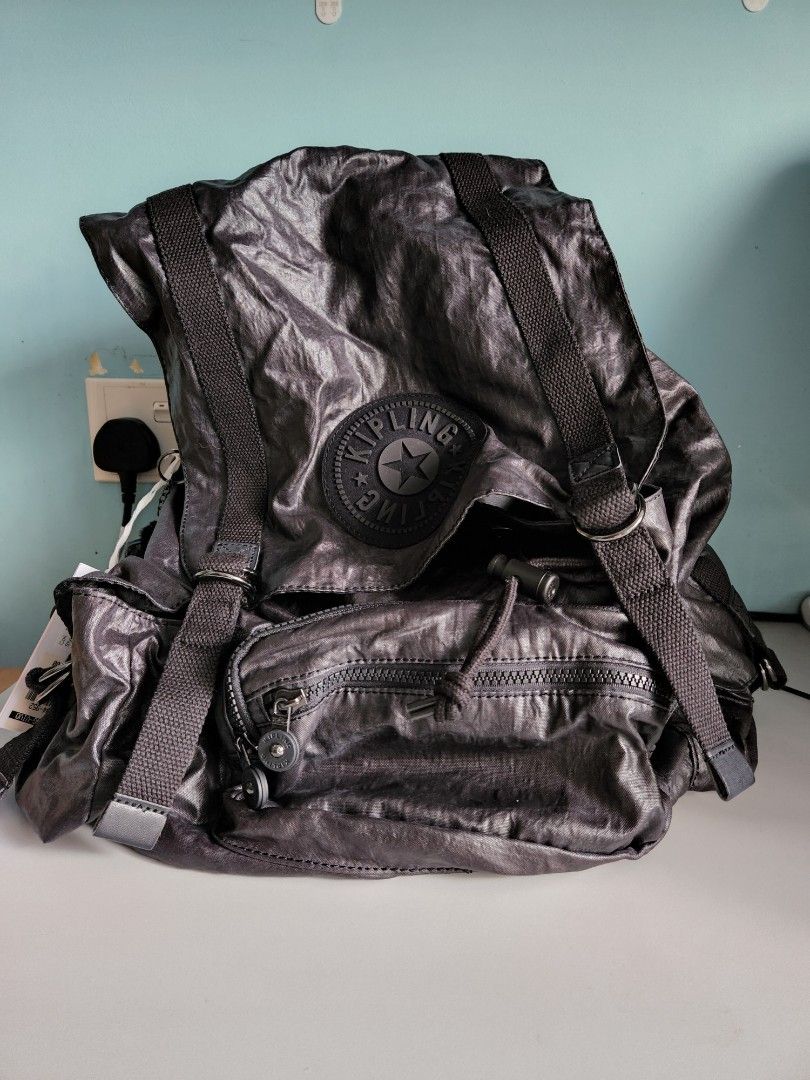 Never used kipling black carrier bag backpack retail 259 without inflation