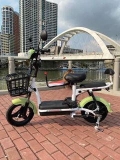 NEW COOPER ELECTRIC BIKE WITH PEDAL AND CHILD CARRIER