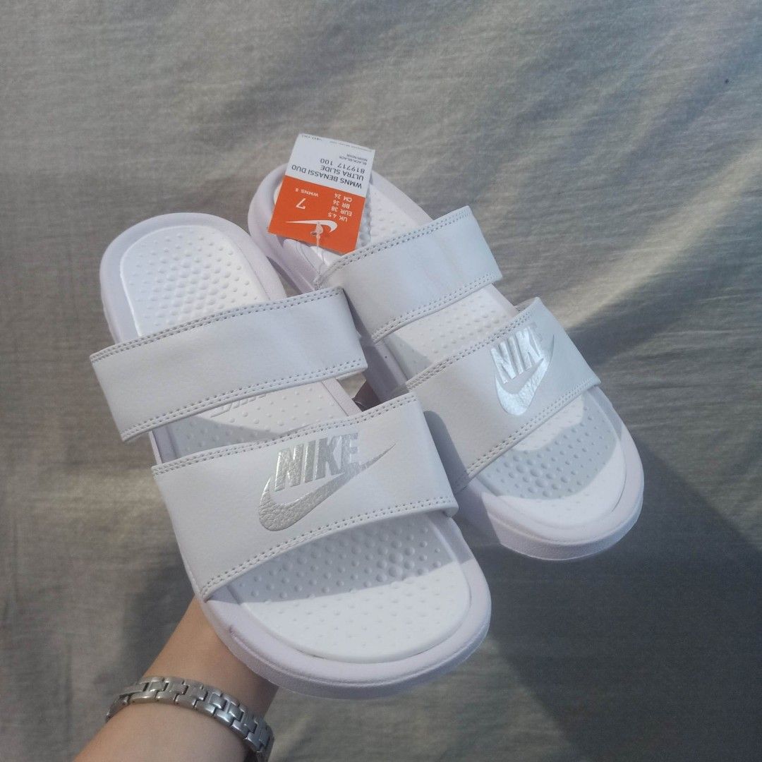 White two hotsell strap nike slides