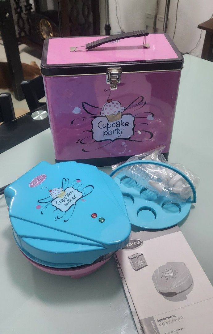 Nostalgia Electrics Cupcake Maker (Category: Bakeware) located in Pasig City. Submitted by iambernabe (Listing ID 1229663860, Image 1). Description: Brandnew Nostalgia Complete set with can 220v / uses adaptor.