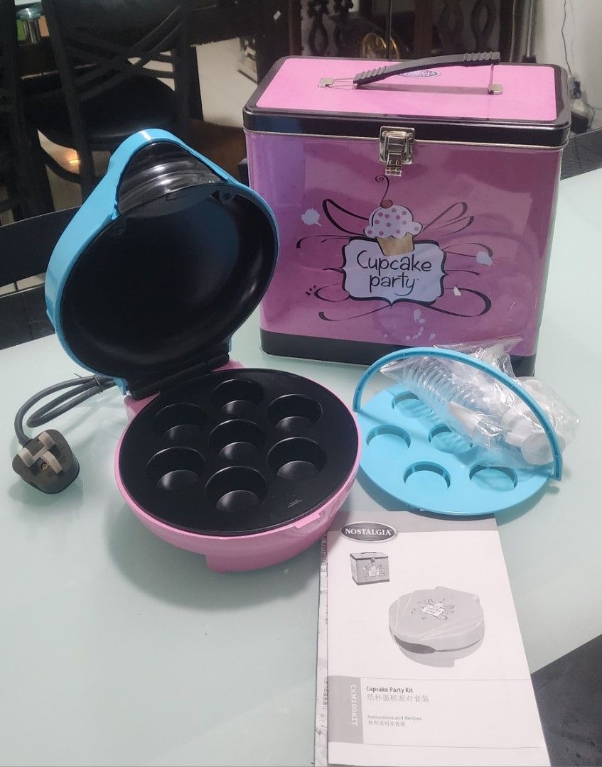 Nostalgia Electrics Cupcake Maker (Category: Bakeware) located in Pasig City. Submitted by iambernabe (Listing ID 1229663860, Image 2). Description: Brandnew Nostalgia Complete set with can 220v / uses adaptor.