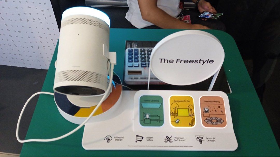 SAMSUNG FREESTYLE PROJECTOR (Category: Projectors) located in Quezon City. Submitted by maryann5721 (Listing ID 1229746903, Image 1). Description: SAMSUNG FULL HD FREESTYLE SMART PROJECTOR * From unboxing to watching in a matter of minutes with Instant Setup * 100" Big Screen experience * Immerse yourself in the middle of the action with Premium 360˚Sound * Discover a world of entertainment with Smart TV Content MODEL SPLSP3BLAXXP SRP 54,999 NET 