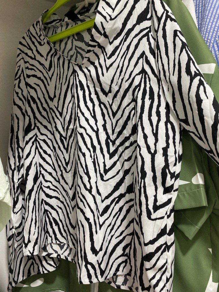 Shein trendy zebra polo top (Category: Blouses) located in Quezon City. Submitted by hoftroy (Listing ID 1229741837, Image 1). Description: Nilabhan and sinukat lng.