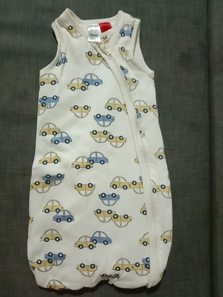 Transitional armless sleep sack zipper