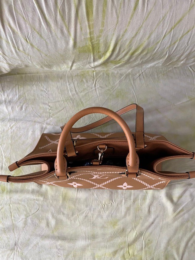 Caramel tote bag (Category: Tote Bags) located in Makati City. Submitted by argin (Listing ID 1232922805, Image 2). Description: Class A. Gold trimmings. Comes with dust bag. *DM for additional photos.