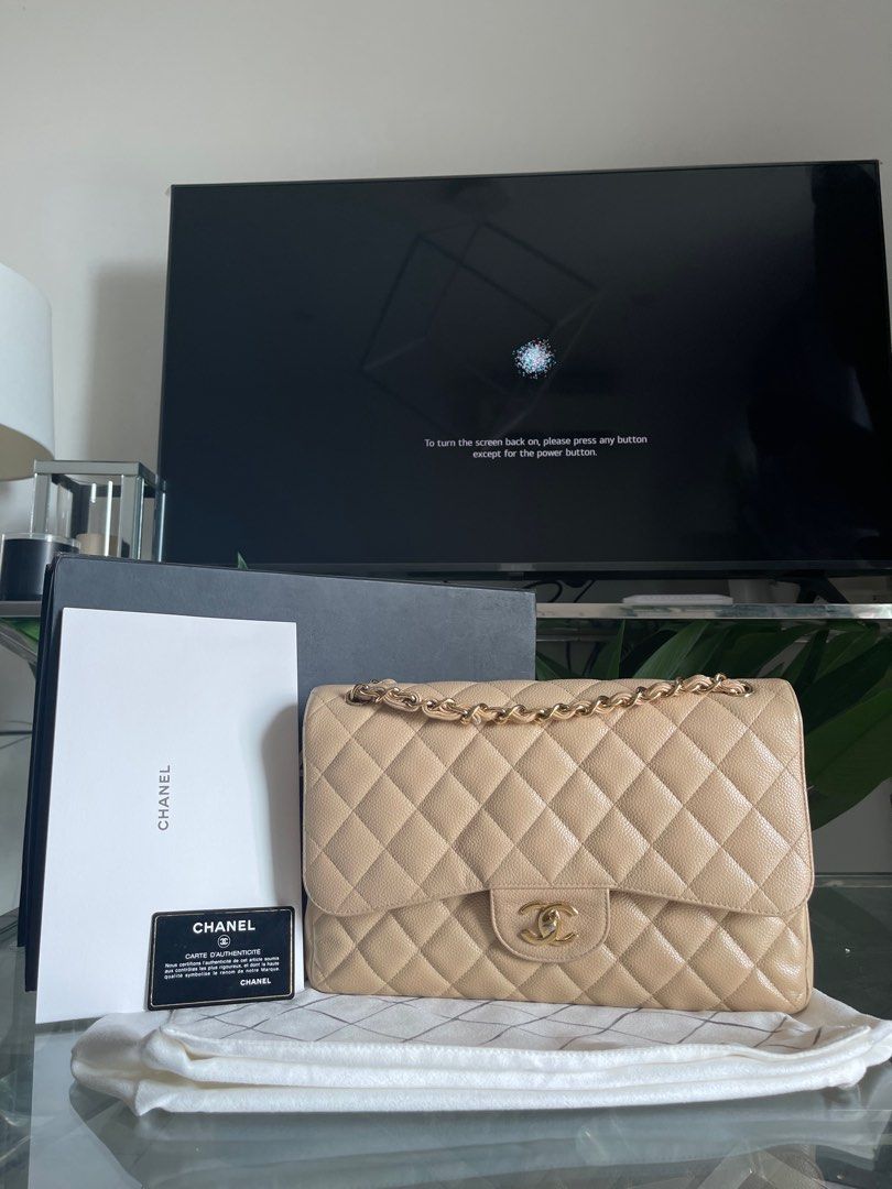 CHANEL Beige Clair Quilted Caviar Leather Classic Jumbo Double Flap Bag,  Luxury, Bags & Wallets on Carousell