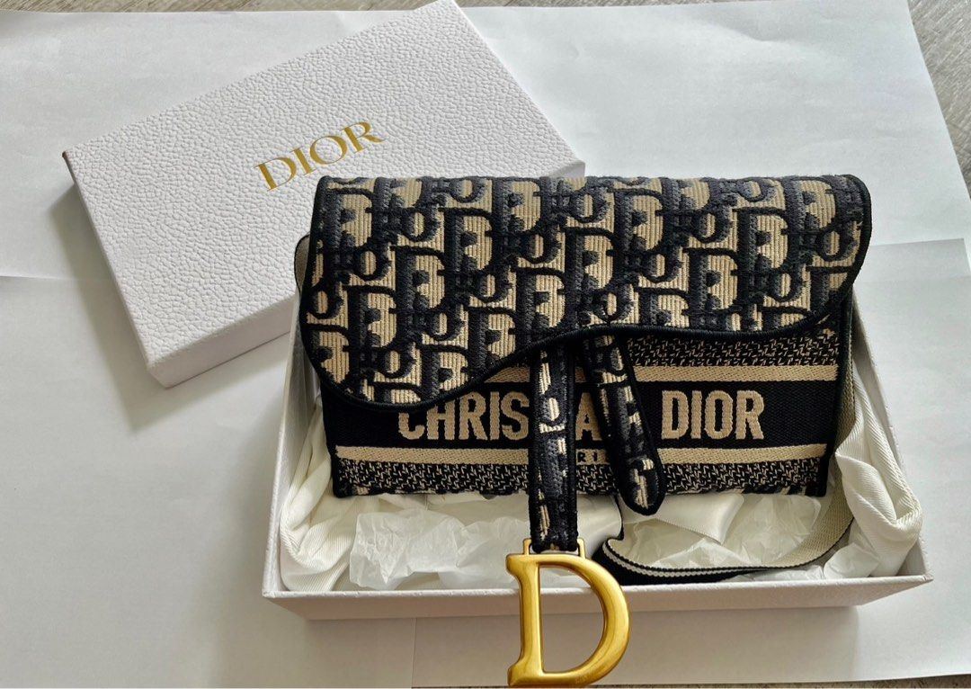Dior Saddle Slim Pouch, Luxury, Bags & Wallets on Carousell