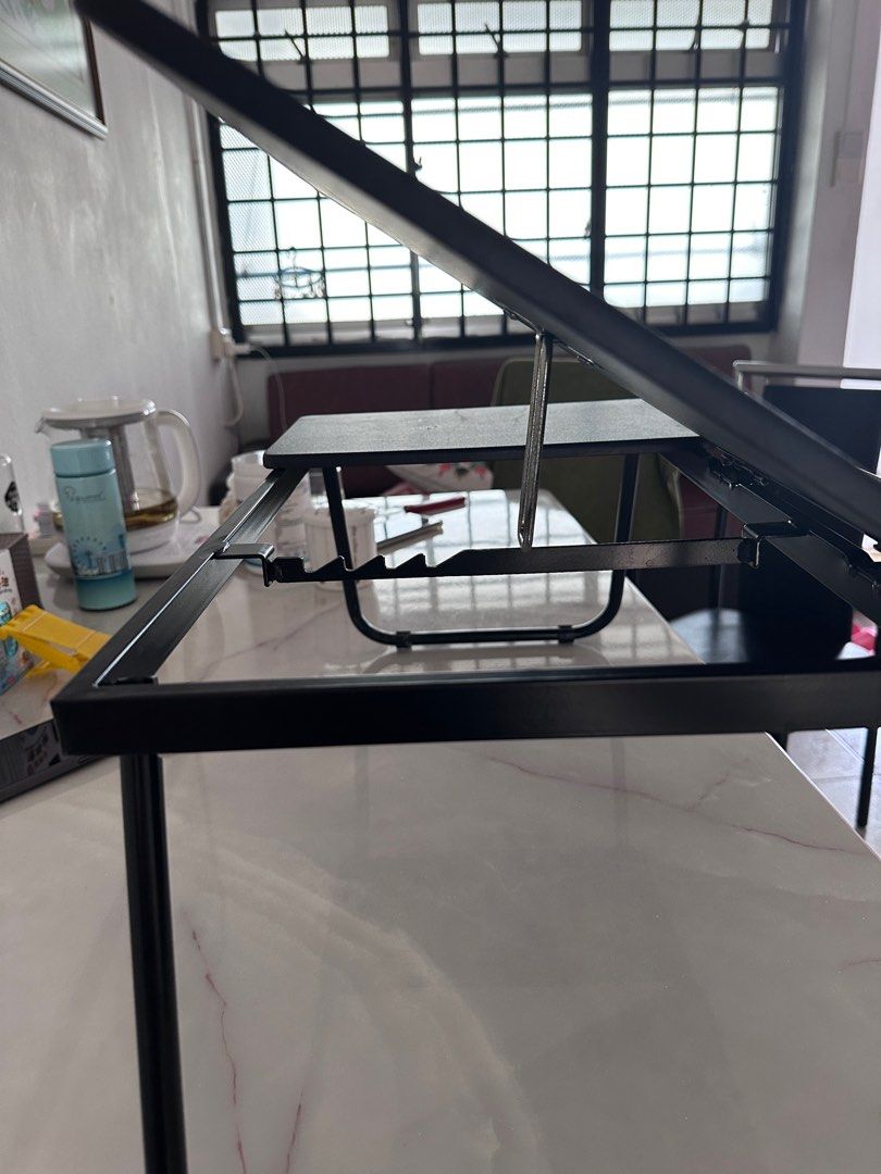 Foldable small table (Category: Tables & Sets) located in Singapore. Submitted by erio_277 (Listing ID 1232930184, Image 3). Description: Used for 1 year+, some screws rusty. 50cm x 32cm.