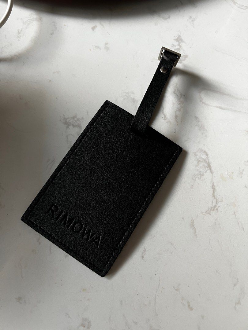 Rimowa leather luggage shop tag