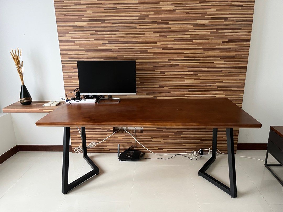 Solid wood table (Category: Tables & Sets) located in Singapore. Submitted by hz265 (Listing ID 1232118347, Image 1). Description: Can be used for dining table or study table Have slight blemish (see last few photos) but otherwise in perfect condition. It’s very heavy (solid wood) so pls arrange for your own movers or delivery service provider Length: 180cm Width: 80cm Height: 75cm Thickness of the table: 5cm Self collection from The Sail after J