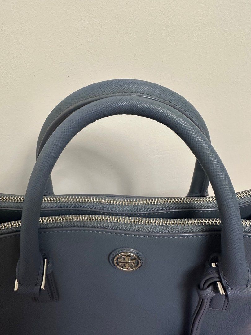 LAYAWAY Tory Burch Robinson Double Zip Tote (Category: Luxury Bags & Wallets) located in San Fernando. Submitted by thehamiltonqueen (Listing ID 1232886517, Image 3). Description: Original Tory Burch Robinson Double Zip Tote Color: Grayish Blue Hardware: Silver Condition: Hairline Scratches on the hardware Inclusion: Crossbody adjustable and Detachable Strap, and Dustbag MOP: BDO,BPI,GCASH Shipping fee shall be shouldered by the buyer.