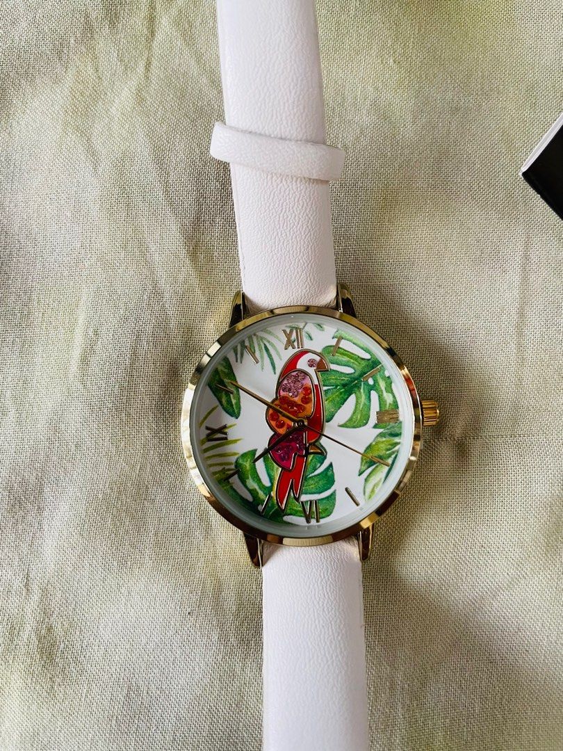 White studded watch (Category: Women's Watches) located in Makati City. Submitted by argin (Listing ID 1232919155, Image 3). Description: Brand new. Never been used. Comes with box. White leather like strap. Gold trims. Studded parrot watch face. .