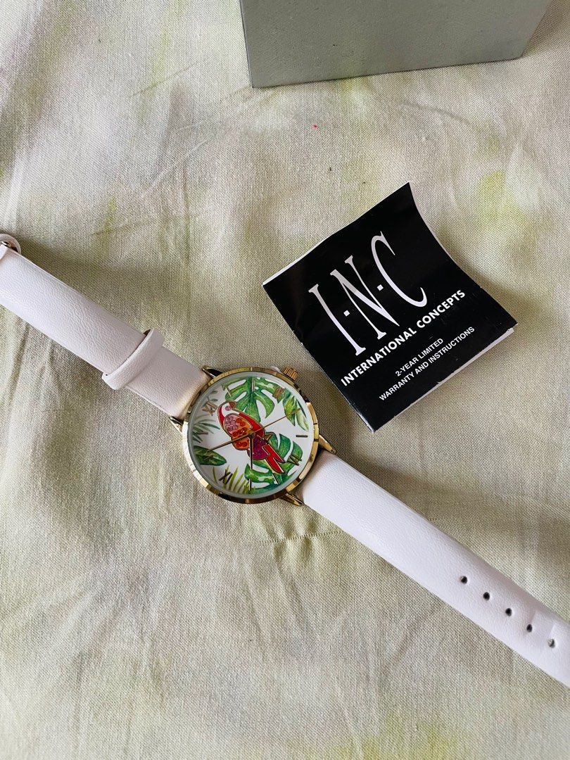 White studded watch (Category: Women's Watches) located in Makati City. Submitted by argin (Listing ID 1232919155, Image 2). Description: Brand new. Never been used. Comes with box. White leather like strap. Gold trims. Studded parrot watch face. .