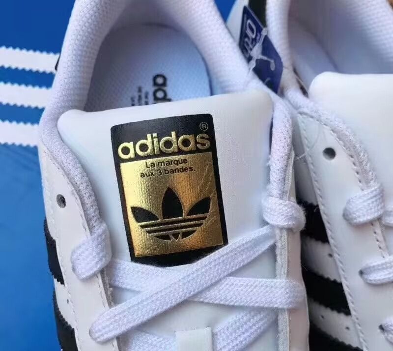 Adidas shell toe shoes