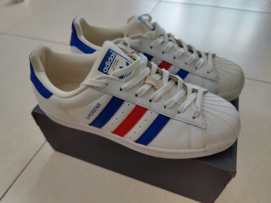 Red white and blue adidas superstars top
