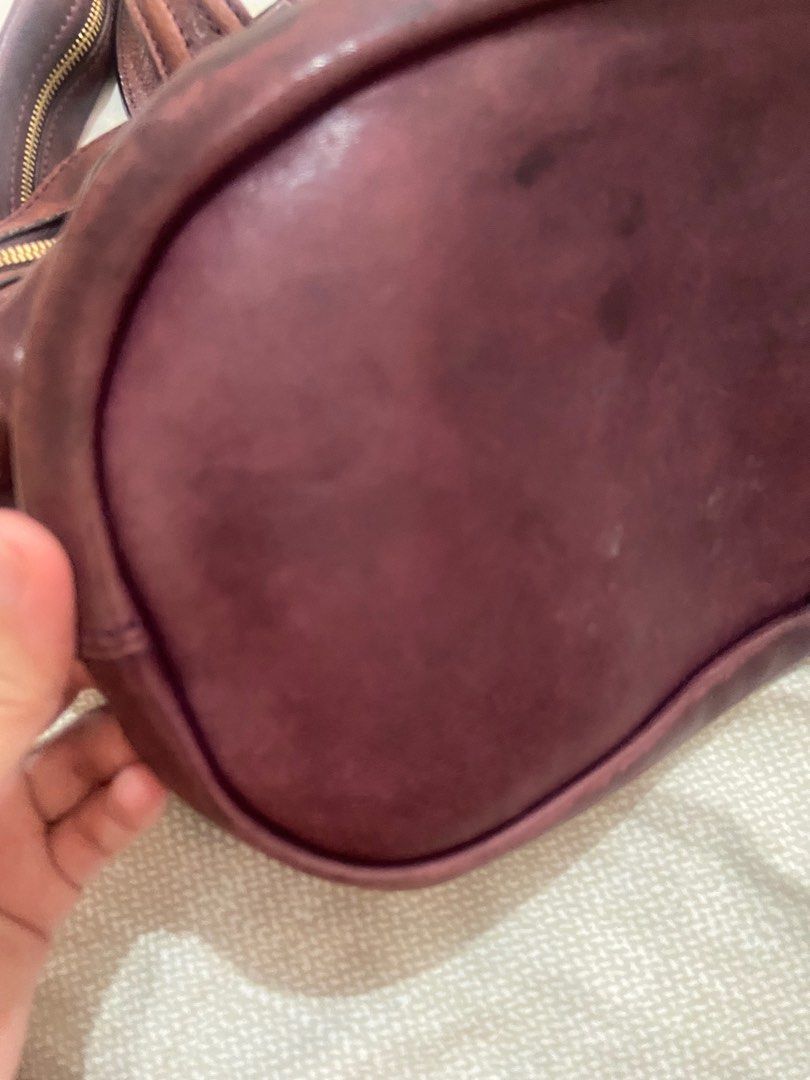 Authentic Givenchy Nightingale (Medium) (Category: Luxury Bags & Wallets) located in Taguig. Submitted by shopxcess.mnl (Listing ID 1233077401, Image 2). Description: - Store bought, guaranteed authentic - Slightly used but with water stains thus selling low, see photos for reference - Comes with original Givenchy dustbag, care card, and leather swatch - Color is eggplant/purple - Shipping is thru grab or lalamove only. But buyer can arrange ship
