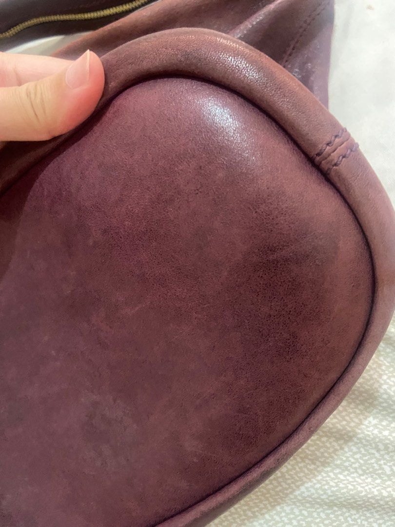 Authentic Givenchy Nightingale (Medium) (Category: Luxury Bags & Wallets) located in Taguig. Submitted by shopxcess.mnl (Listing ID 1233077401, Image 3). Description: - Store bought, guaranteed authentic - Slightly used but with water stains thus selling low, see photos for reference - Comes with original Givenchy dustbag, care card, and leather swatch - Color is eggplant/purple - Shipping is thru grab or lalamove only. But buyer can arrange ship
