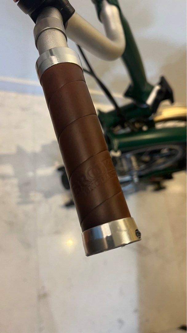 Brompton (Category: Bicycles) located in Singapore. Submitted by viragez (Listing ID 1233164657, Image 4). Description: Racing green color, 3 gear Brompton with brooks leather saddle and brooks leather grips. Well maintained and lightly used. Price negotiable but no low baller thank you. .