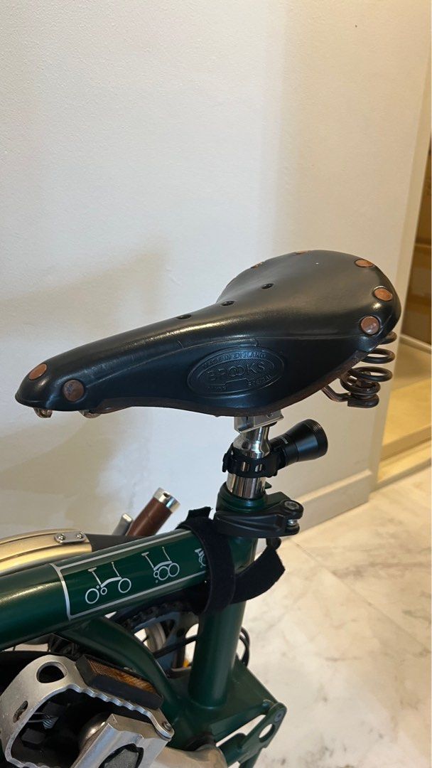 Brompton (Category: Bicycles) located in Singapore. Submitted by viragez (Listing ID 1233164657, Image 3). Description: Racing green color, 3 gear Brompton with brooks leather saddle and brooks leather grips. Well maintained and lightly used. Price negotiable but no low baller thank you. .