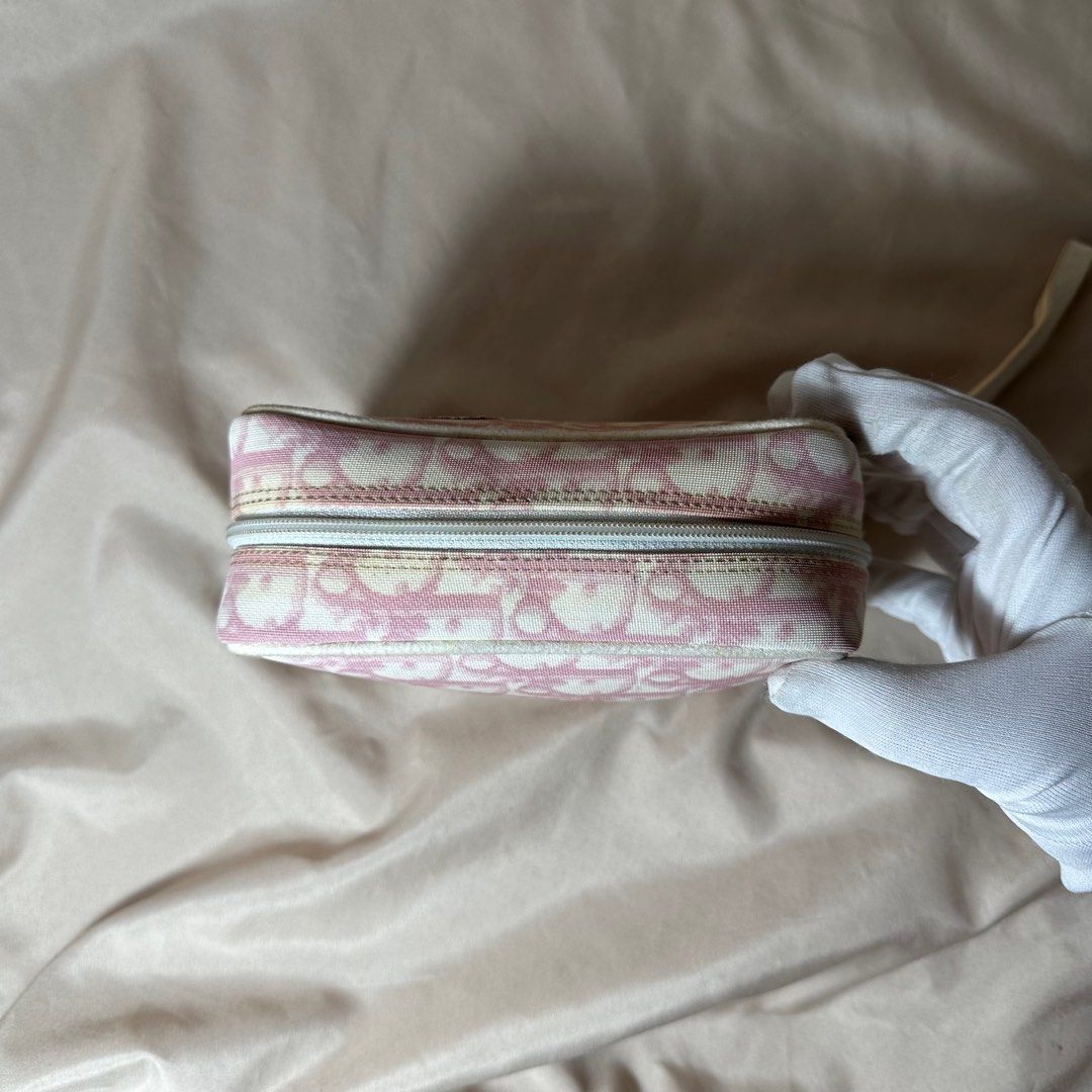 Dior pink trotter wristlet pouch (Category: Luxury Bags & Wallets) located in Baguio. Submitted by stylehouseph (Listing ID 1233147110, Image 2). Description: 🤍 Di.or Pink trotter wristlet pouch 🤍 Authentic 🤍 Rank AB 🤍 Coating of piping and number 2 & strap needs retouch ; Needs cleaning only 🤍 Valued @ $290 / ₱16k (preloved condition) 🤍 ₱ 4900 only.