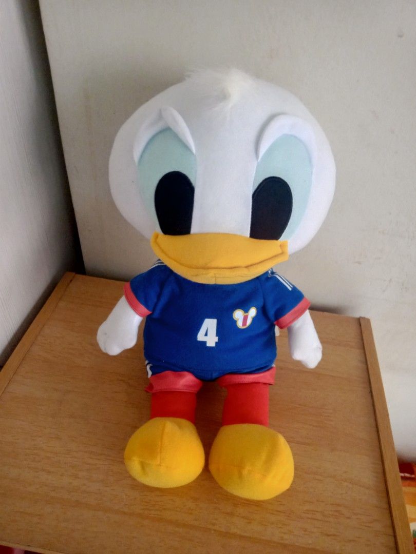 Donald duck/ football costume, Furniture & Home Living, Home Decor