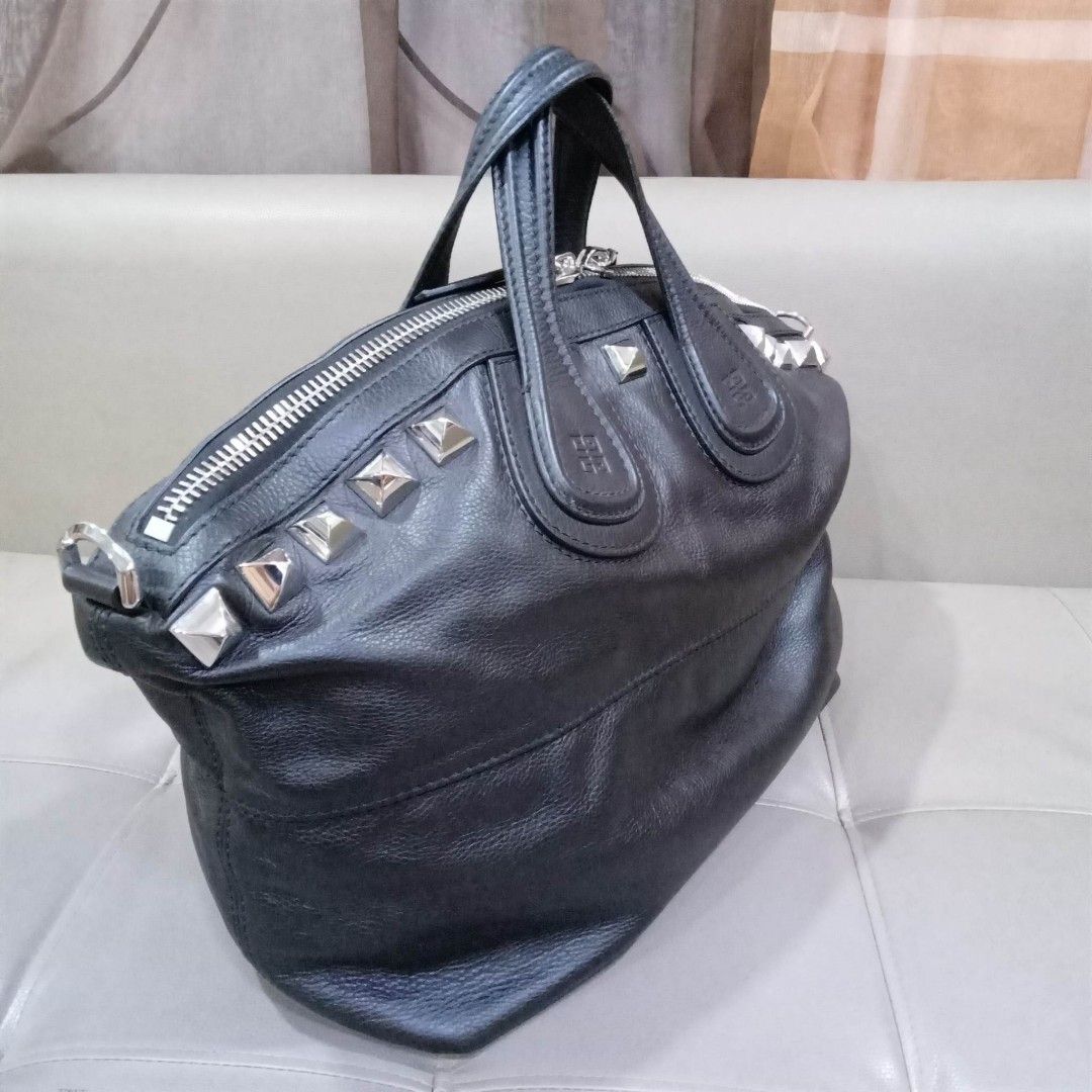 Givenchy Nightingale Medium (Category: Luxury Bags & Wallets) located in Taguig. Submitted by esa.agustin (Listing ID 1233073182, Image 2). Description: Original Givenchy Nightingale medium black calf leather. With dust bag, sling strap and carecard. Made in Italy..