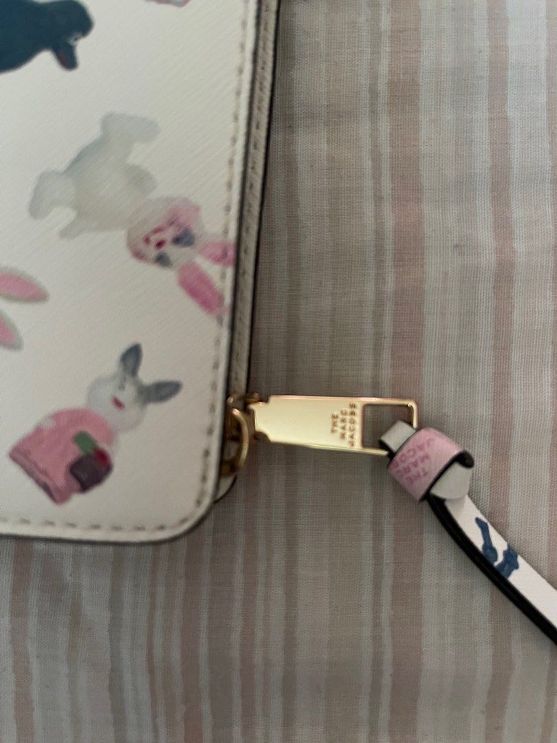 MARC JACOBS FRENCH WALLET (Category: Luxury Bags & Wallets) located in Paranaque City. Submitted by msjam63 (Listing ID 1233028348, Image 3). Description: Barely used In excellent condition 10 card slots zippered coins compartment No more cards but guaranteed authentic Slightly neg. no low ballers .