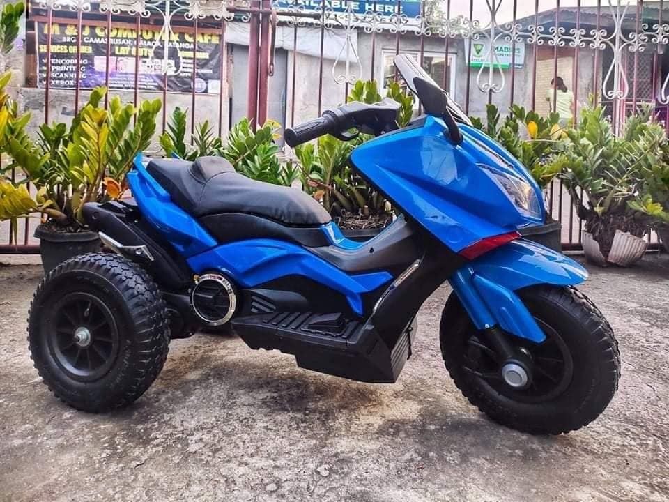 Nmax Motorcycle for kids (Category: Motorbikes for Sale) located in Pasay City. Submitted by mjmsvarietystore (Listing ID 1233168950, Image 2). Description: Nmax Motorcycle for kids Price: 5,500 PHP Colors: Red, Blue, and White 🔴Rubber tires 🔴Leather seat 🔴2gears/with USB/Mp3 🔴Suitable for ages 3-8 years old 🔴Ideal gift for kids 🔴We do Shipping Nationwide For inquiries and to order: PM me on Facebook or Call/text me on 09603073035/ 09154178