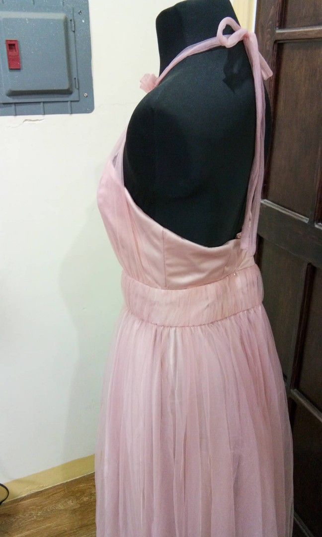 Pink Halter Style Gown (Category: Evening dresses & gowns) located in San Fernando. Submitted by preloved.by.mb (Listing ID 1233102409, Image 2). Description: Pink Halter Style Gown - only worn once for a wedding - floor length, tulle skirt, with slit, backless -can fit M-L frames - For reference, I am 5'6" in height and weighed around 65kgs when I wore this..