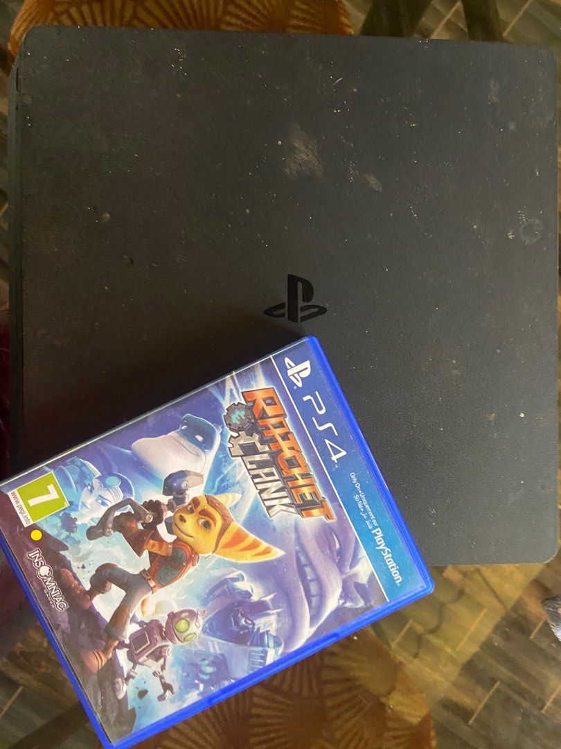 PlayStation 4 Slim with Free game (No controller) (Category: PlayStation) located in Barili. Submitted by redoblevincentnino (Listing ID 1233193566, Image 1). Description: Now, I barely used it and have nothing to do with it :) that’s why I’m selling it. It has a little flaw but very small detail and it comes with free game with that photo. No controller is included because the reason is that it’s broken but you can still have it if you want it t