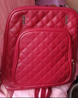 Red leather bag pack
