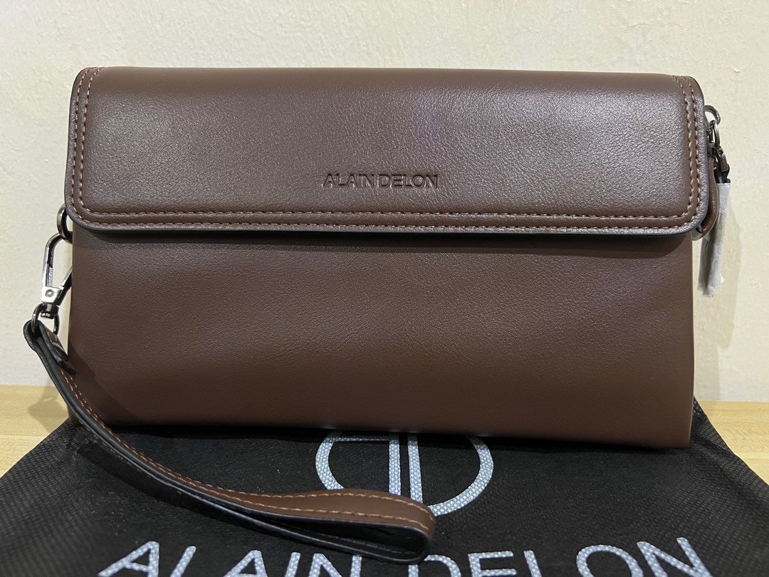Alain delon clutch best sale bag