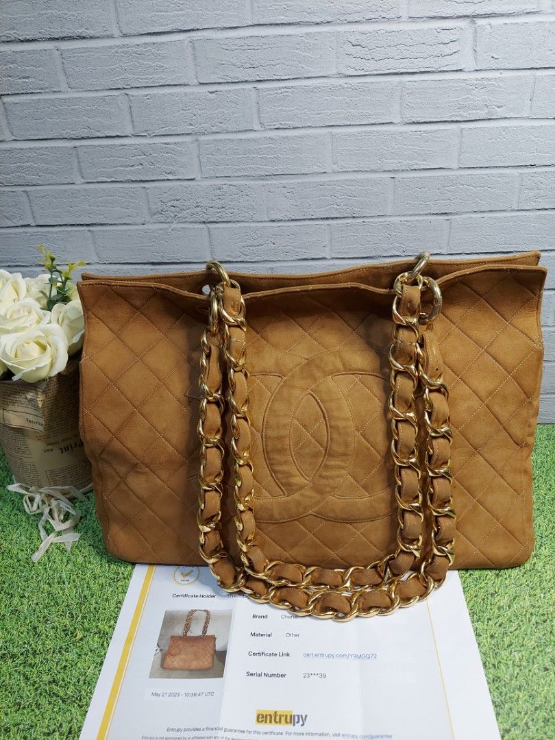 Authentic chanel GST XL vintage suade