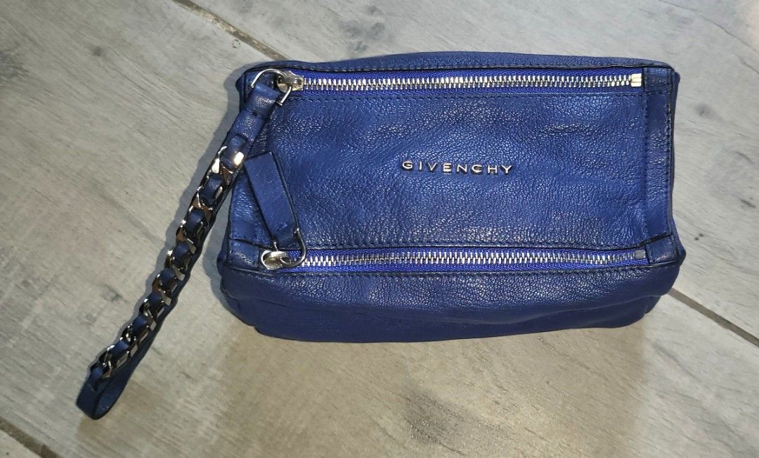 Authentic Givenchy Pandora Pouch #luxluve #luxsale (Category: Luxury Bags & Wallets) located in Quezon City. Submitted by ryrai (Listing ID 1233260135, Image 2). Description: Guaranteed Authentic Store-bought (Greenbelt 2014) Honest Flaw ● Stored leather smell ● Barely visible discoloration/darkening in some areas ● Deformed shape of bag and strap due to storage ● Minimal stains interior pocket ● Possibly in need OF BAG SPA but too lazy to do so 