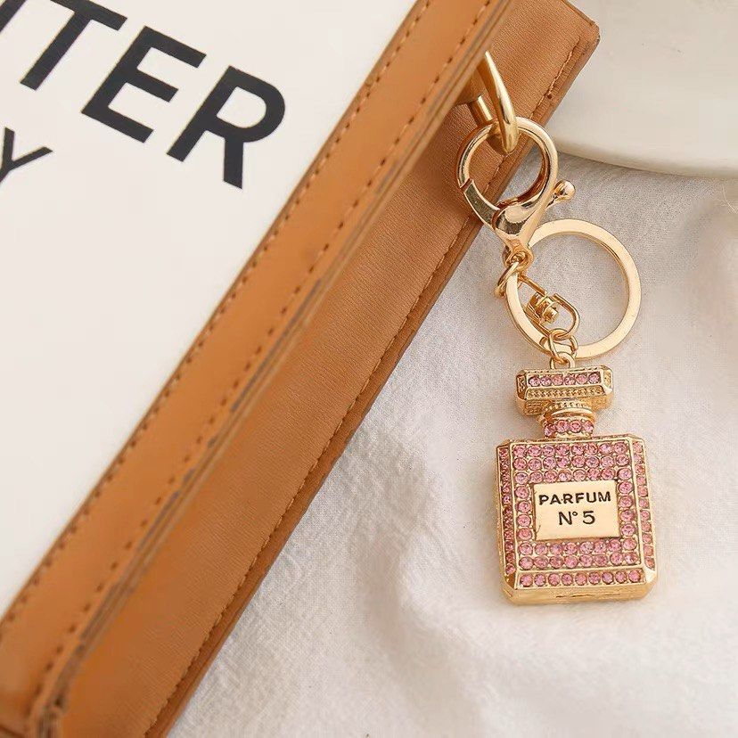 COCO CHANEL PERFUME KEYCHAIN / BAG CHARM, Women's Fashion, Watches