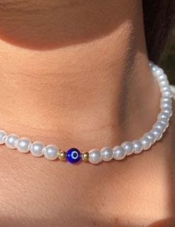 Evil eye faux pearl necklace and bracelet