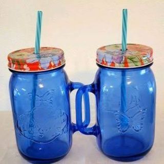 Pioneer Woman blue sapphire 32oz. 1pc Glass mason jar mug with reusable hard plastic straw.

Note: Floral Lip not Included‼️