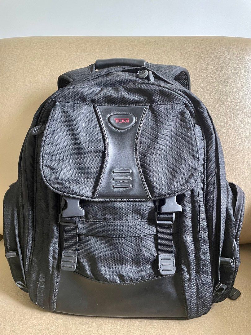 TUMI (520C) Nylon Laptop Backpack (Category: Backpacks) located in Cabuyao City. Submitted by biancatal29334 (Listing ID 1233287058, Image 1). Description: Pre-owned, highly durable & tough nylon material (17”H x17”W) -Overall condition is very good except for some peeling in the metal zipper pull tab (barely noticeable), covered by zip fabric on top) -Storebought in the US - Very spacious inside (see picture, 15” laptop & 11”Mac Air can fit toge
